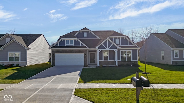 view of front facade with a garage and a front lawn