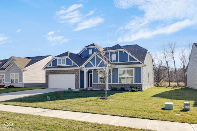 craftsman house with a garage and a front lawn