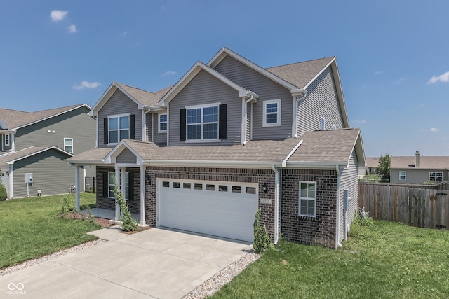 view of front of home with a garage and a front lawn