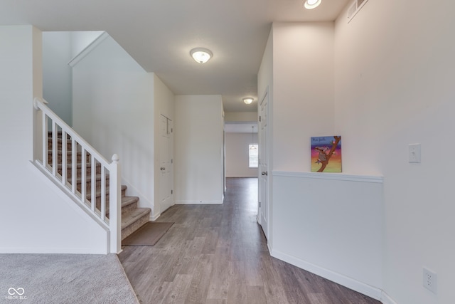 hallway featuring hardwood / wood-style floors