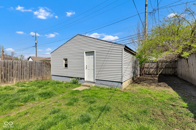 view of outdoor structure featuring a fenced backyard