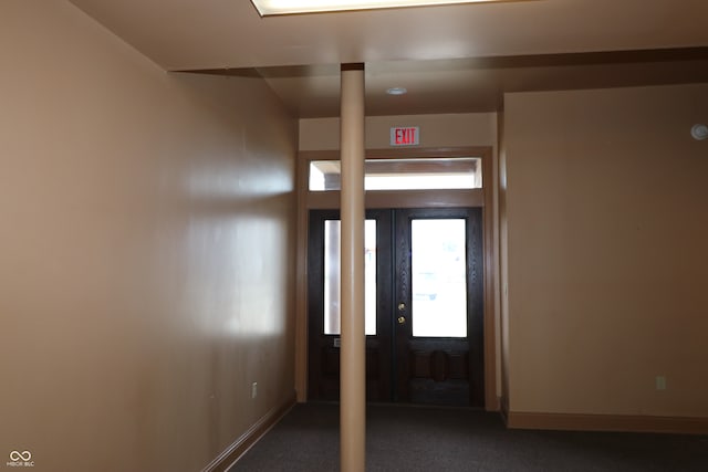 entrance foyer featuring carpet