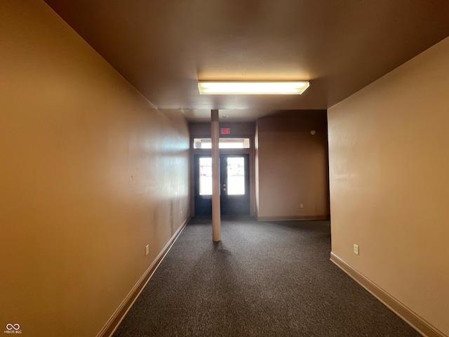 hall with carpet flooring