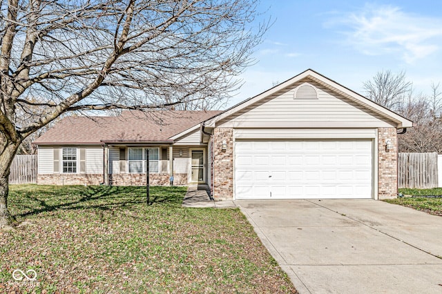 ranch-style home with a garage and a front lawn