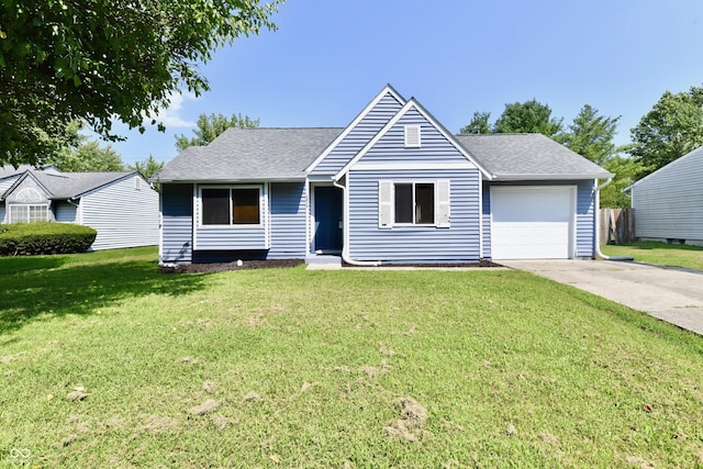 view of front of property with a front yard, driveway, a shingled roof, and a garage