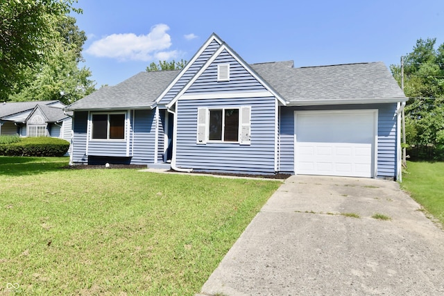 view of front of house with a garage, roof with shingles, and a front lawn