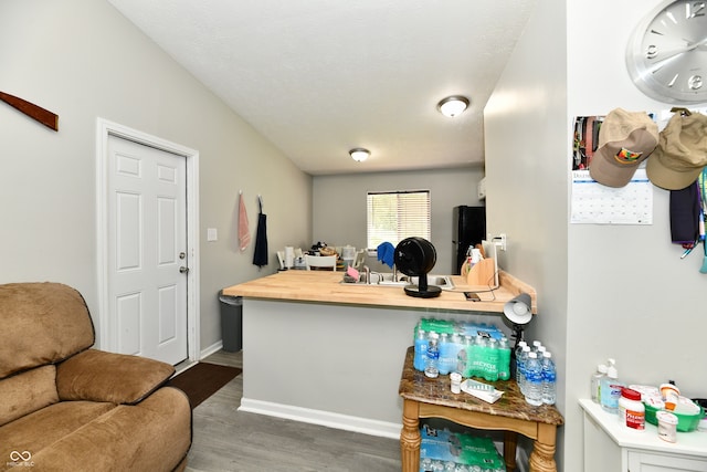 home office featuring hardwood / wood-style floors