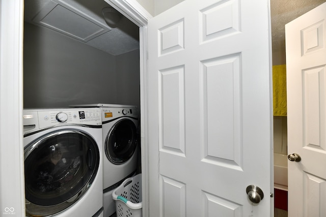 laundry area with attic access and laundry area