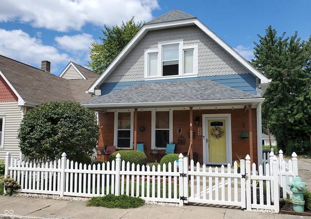 view of front of property featuring covered porch