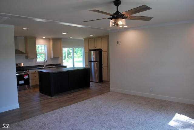 kitchen with dark hardwood / wood-style floors, stainless steel refrigerator, wall chimney exhaust hood, range, and a center island