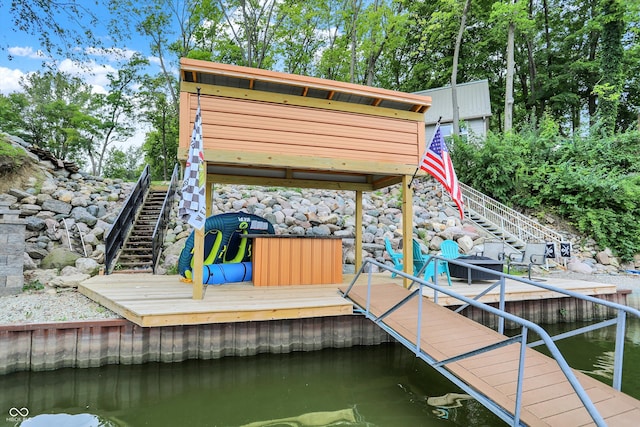 view of dock with a water view