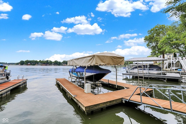 view of dock with a water view