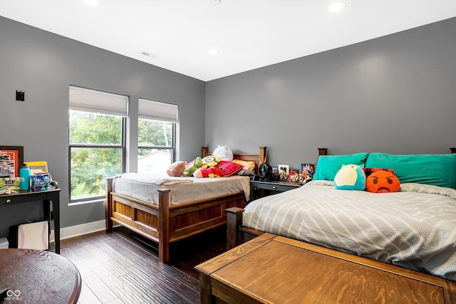 bedroom with wood-type flooring