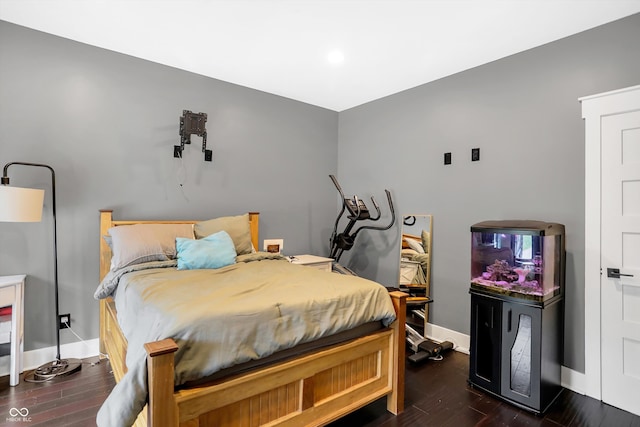 bedroom featuring dark hardwood / wood-style floors