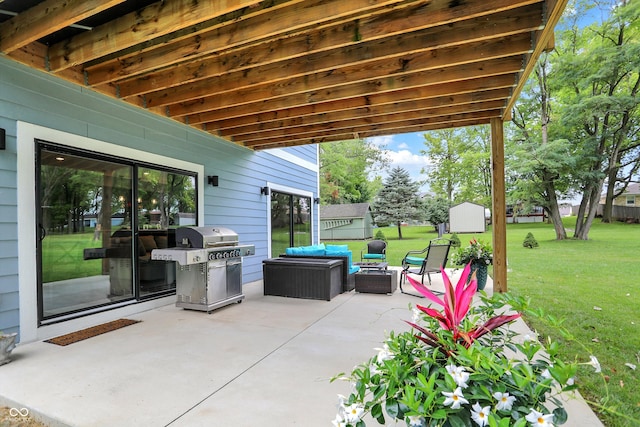 view of patio / terrace featuring outdoor lounge area, a storage shed, and a grill