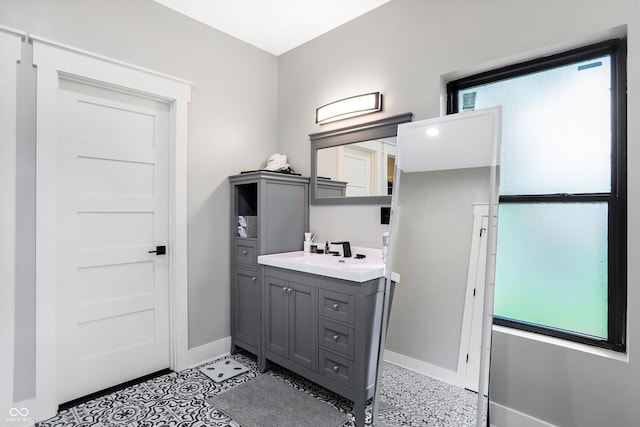 bathroom featuring tile patterned floors and vanity