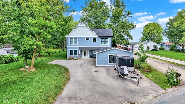 view of front of house featuring a front lawn