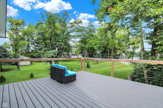 wooden terrace with a yard