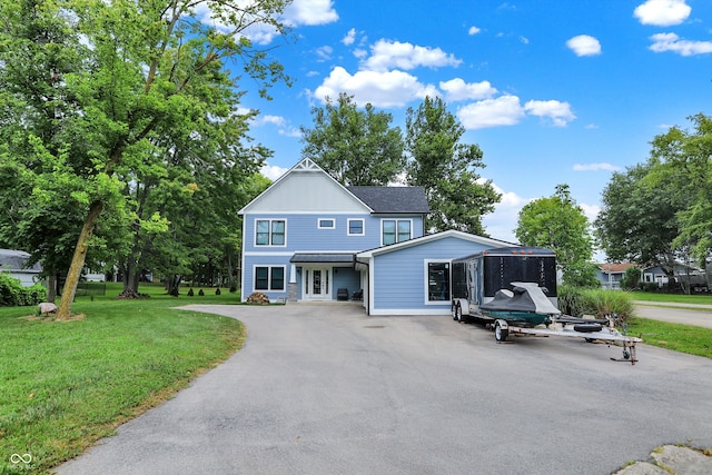 view of front of home featuring a front lawn