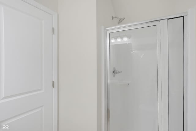 bathroom with an enclosed shower