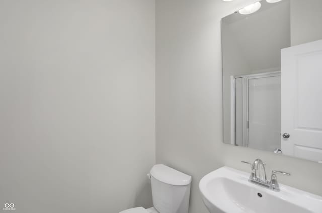 bathroom with sink and toilet