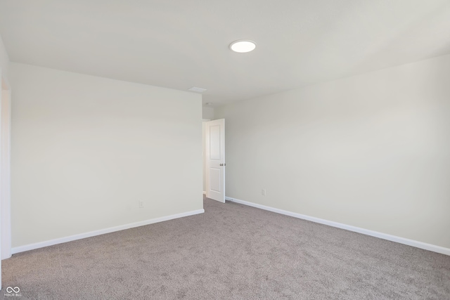 empty room featuring carpet