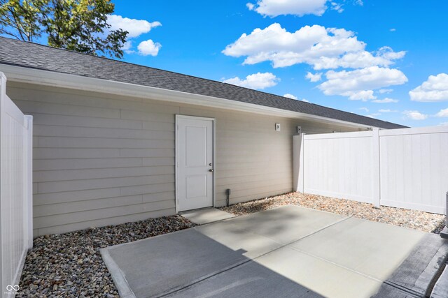 doorway to property with a patio area