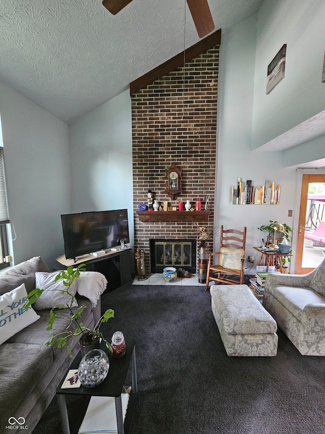 carpeted living room with high vaulted ceiling, a textured ceiling, and a brick fireplace