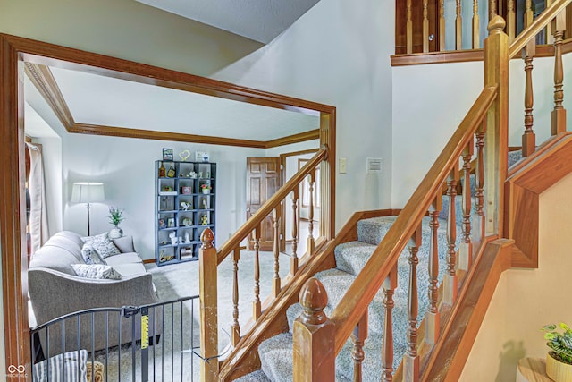 stairs featuring ornamental molding