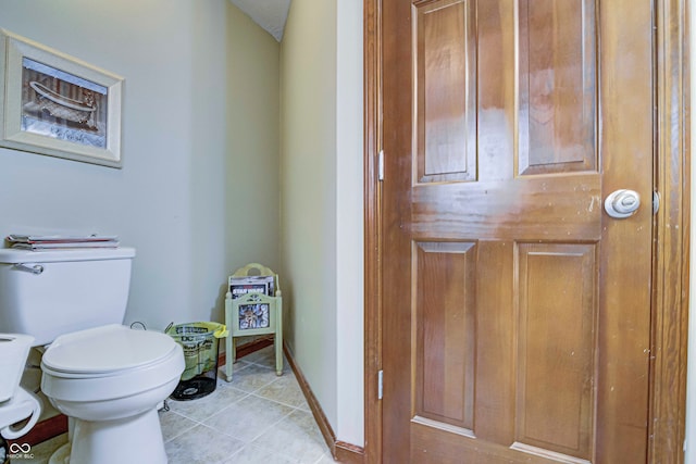 bathroom featuring toilet and tile patterned floors