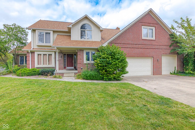 view of front of house with a front lawn and a garage