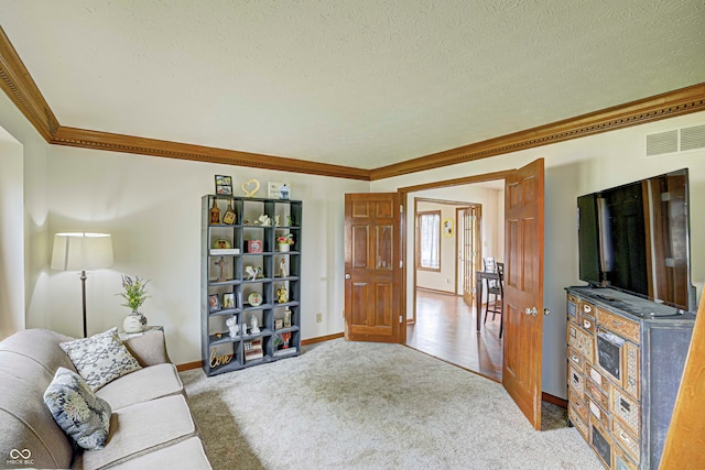 carpeted living room with a textured ceiling and crown molding