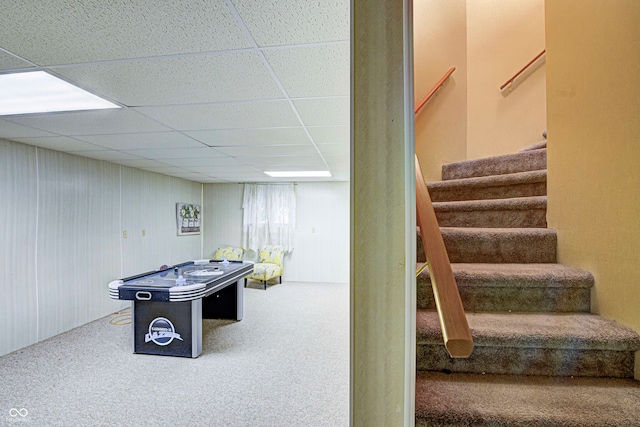 game room featuring a paneled ceiling and carpet floors