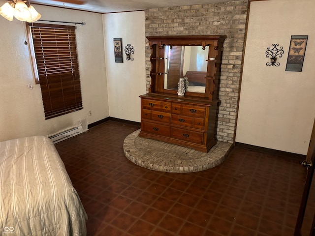 tiled bedroom with a baseboard heating unit