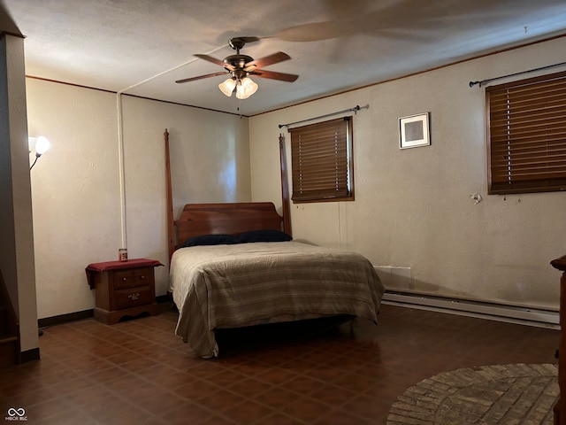 bedroom featuring ceiling fan, a baseboard radiator, and tile patterned floors