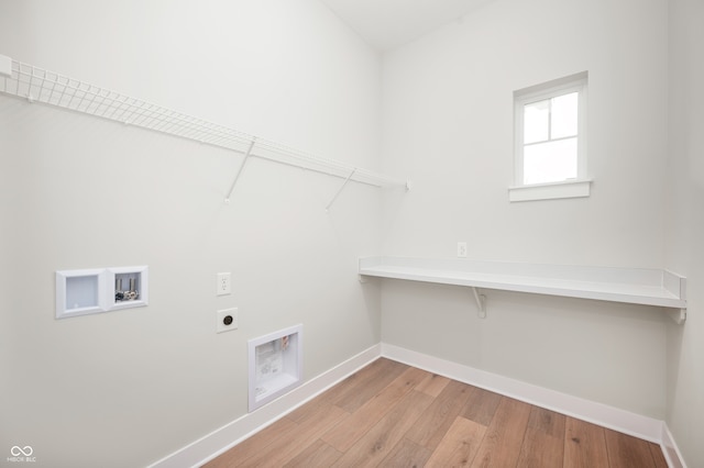 washroom with washer hookup, electric dryer hookup, and light wood-type flooring