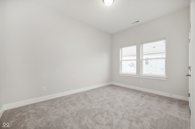 view of carpeted spare room