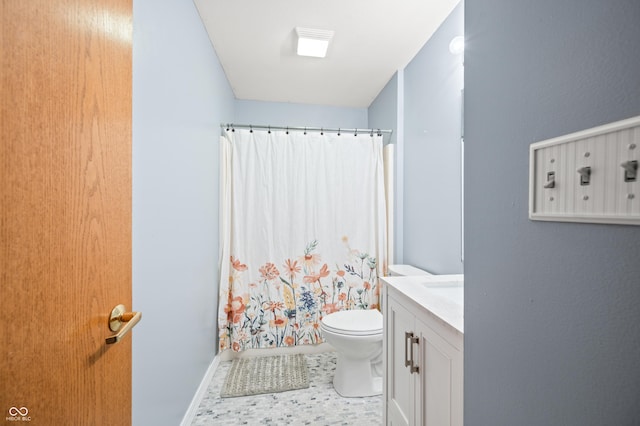 1936 Broadmoor Ln, Columbus, IN 47203 - full bathroom with toilet, vanity, curtained shower, and baseboards