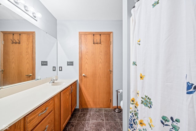 1936 Broadmoor Ln, Columbus, IN 47203 - bathroom with vanity, baseboards, and a shower with curtain