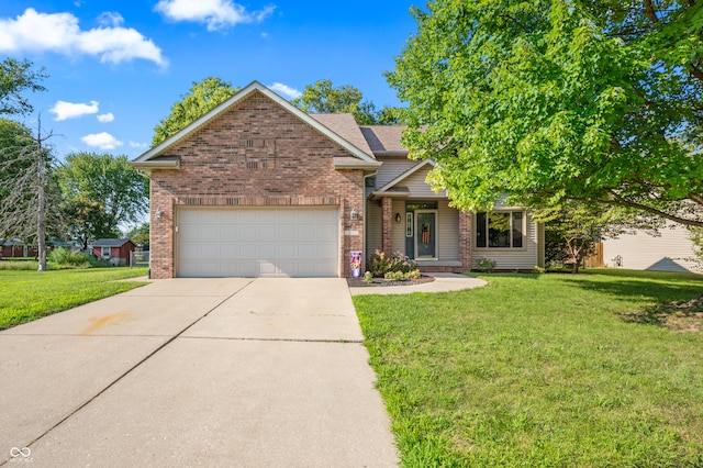 view of front of house with a front lawn and a garage