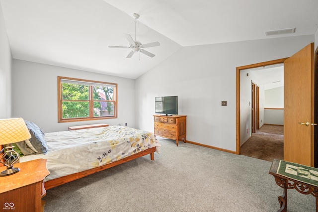 1936 Broadmoor Ln, Columbus, IN 47203 - carpeted bedroom with vaulted ceiling, ceiling fan, and baseboards