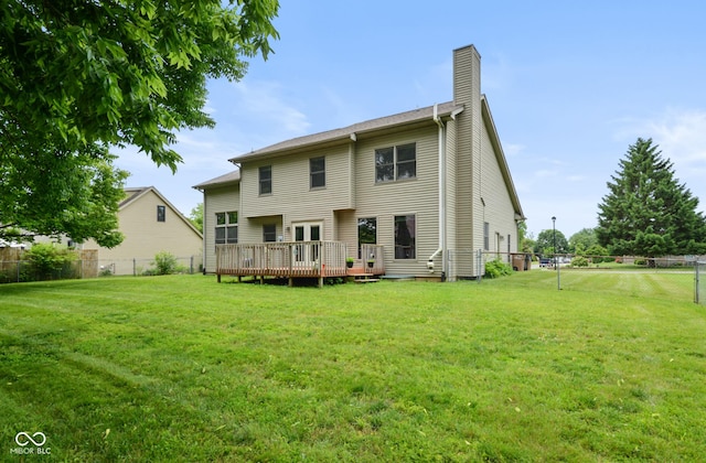 1936 Broadmoor Ln, Columbus, IN 47203 - back of house featuring a chimney and a wooden deck