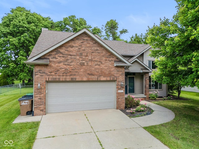 1936 Broadmoor Ln, Columbus, IN 47203 - view of front facade featuring brick siding, roof with shingles, and concrete driveway