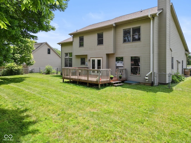1936 Broadmoor Ln, Columbus, IN 47203 - back of property with a wooden deck, a chimney, and french doors