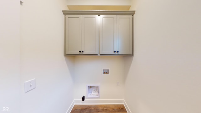 laundry area featuring cabinets and washer hookup