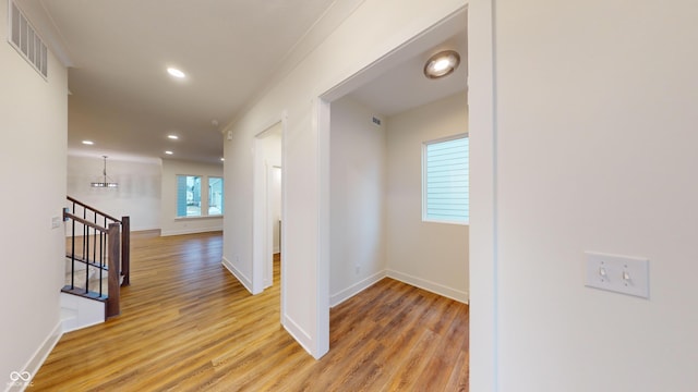 hallway featuring light hardwood / wood-style flooring