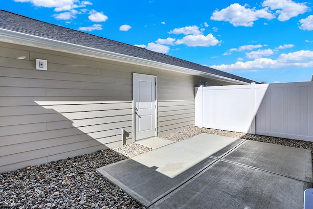 property entrance with a patio area