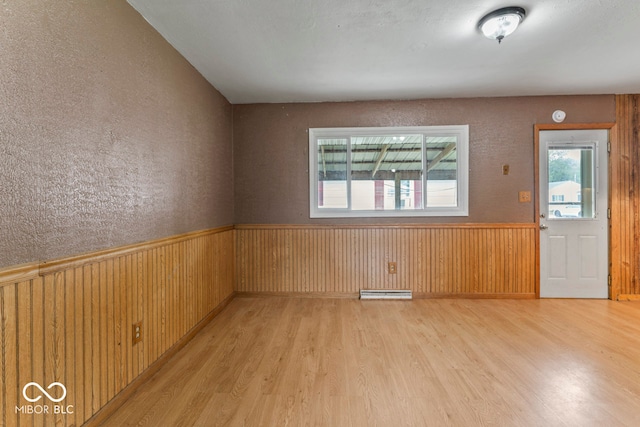 empty room featuring light hardwood / wood-style floors