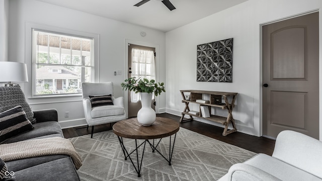 1210 Finley Ave, Indianapolis, IN 46203 - living room with healthy amount of natural light, wood finished floors, ceiling fan, and baseboards