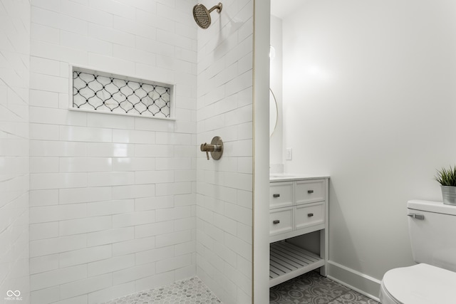 1210 Finley Ave, Indianapolis, IN 46203 - full bath featuring toilet, a tile shower, baseboards, and vanity